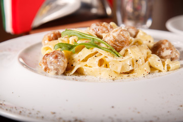 pasta with with meat and white sauce