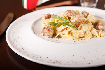 pasta with with meat and white sauce
