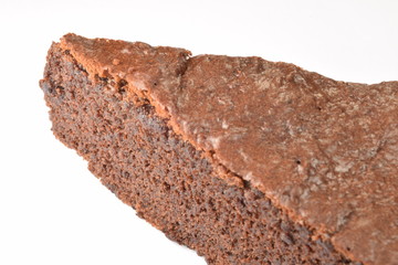  Sweet and tasty chocolate cake on a white background.