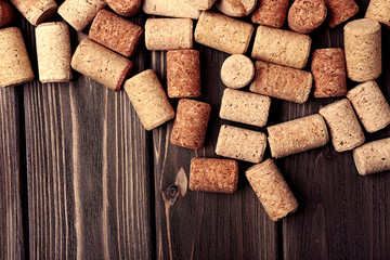 Wine corks on wooden background