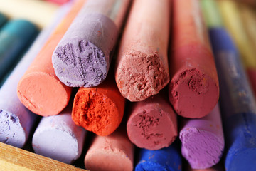 Colorful chalk pastels in box close up
