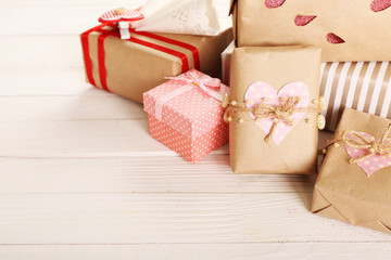 Beautiful gift box on wooden table. Valentine Day concept