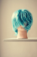 mannequin with a blue wig