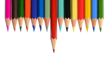 Front view of aligned coloring crayons isolated