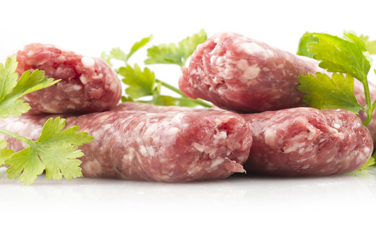 sausage with parsley leaves on the white