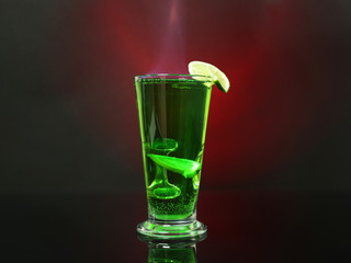 Flaming green cocktail on colorful background