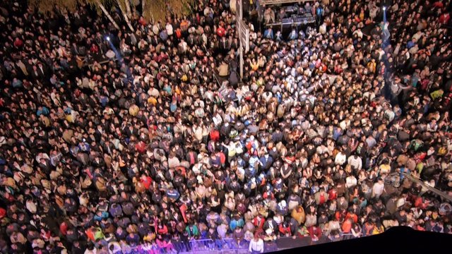 Flying over the stage and spectators at the concert