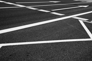 Arrow signs as road markings on a street