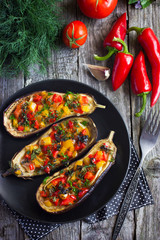 Stuffed eggplant with fried vegetables