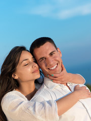 Fototapeta premium happy young romantic couple have fun arelax relax at home