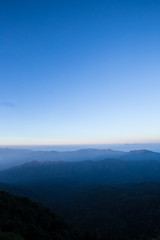 Horizontal, horizontal sunrise sky from mountain peak