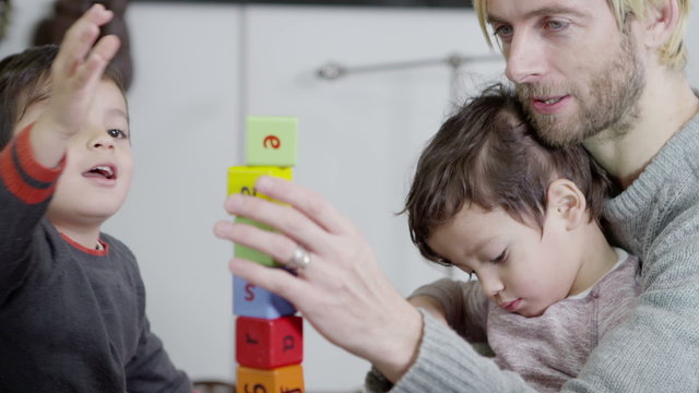 Building blocks come tumbling down - Powered by Adobe