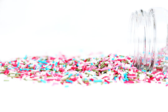 Colored sugar sprinkles and its container