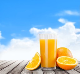Fruit. Orange juice in glass with mint,  fresh fruits on wooden