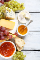 Gourmet cheeses with honey and jam