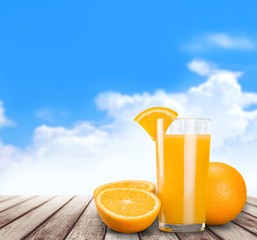 6474. Orange juice in glass with mint,  fresh fruits on wooden