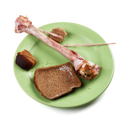 Leavings. Dirty plate after food from the remains - Stock image