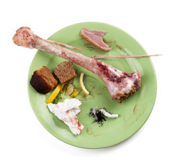 Leavings. Dirty plate after food from the remains - Stock image