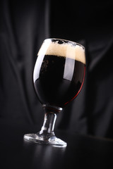 Glass of dark beer