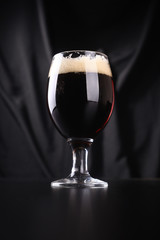 Glass of dark beer