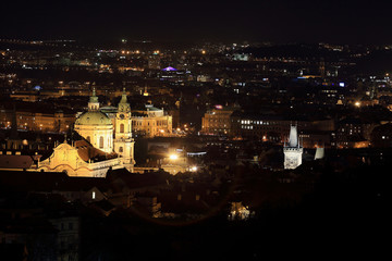 Fototapeta na wymiar Night Prague City with St. Nicholas' Cathedral, Czech Republic