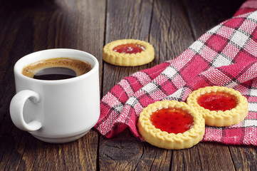 Coffee cup and tasty cookies