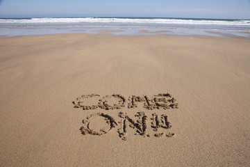 come on text in sand beach