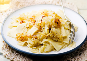 Noodles with stewed cabbage.