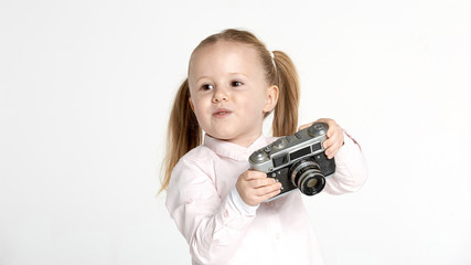 Smiling and having fun the photographer a beautiful blond girl o