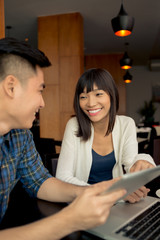 Asian couple in cafe