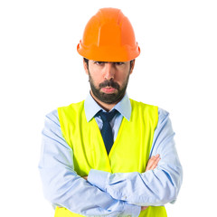 Sad worker over white background