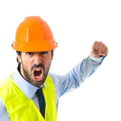 Workman giving punch over white background