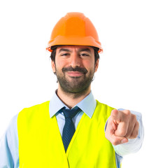 Workman pointing to the front