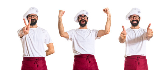 Chef with thumb up over white background