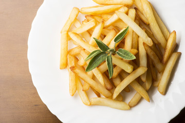 fried potatoes on the wooden table