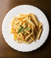 fried potatoes on the wooden table