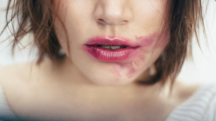 Sexual   lips with the smeared lipstick