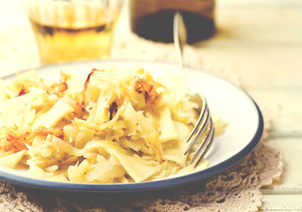 Noodles with stewed cabbage.