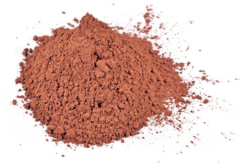 Heap of cocoa powder on a white