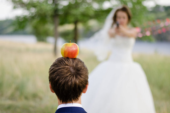 Bride shoot at groom