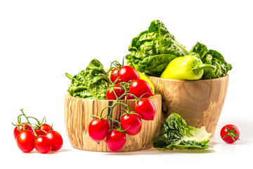 bunch of vegetables in the wooden bowl