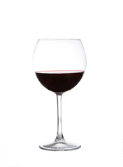 red wine swirling in a goblet wine glass, isolated on a white ba