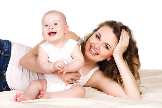 Portrait of happy mother with baby on a white background.