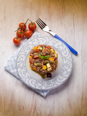 rice with zucchinis capsicum  olives and tomatoes