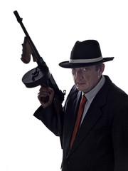 Old style gangster with tommy gun, on white background