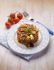 rice with zucchinis capsicum  olives and tomatoes
