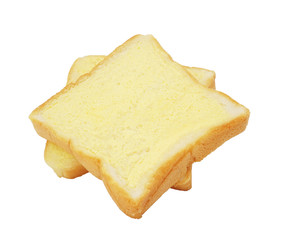 square bread with butter on white background