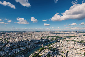 Aerial view of the city with blue cloudy sky from the Eiffel Tow