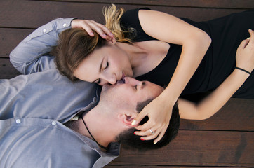 Upper view of young kissing couple