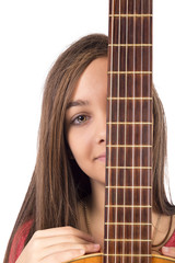 Closeup portrait of caucasian teenage girl with guitar